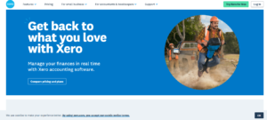 Xero homepage banner showing a worker in construction gear using a jackhammer, with text promoting real-time finance management using Xero accounting software.